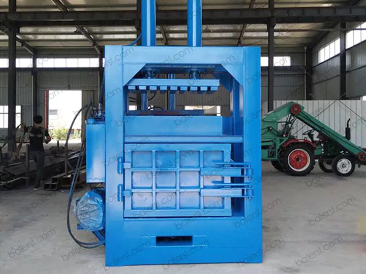 Vertical metal baler